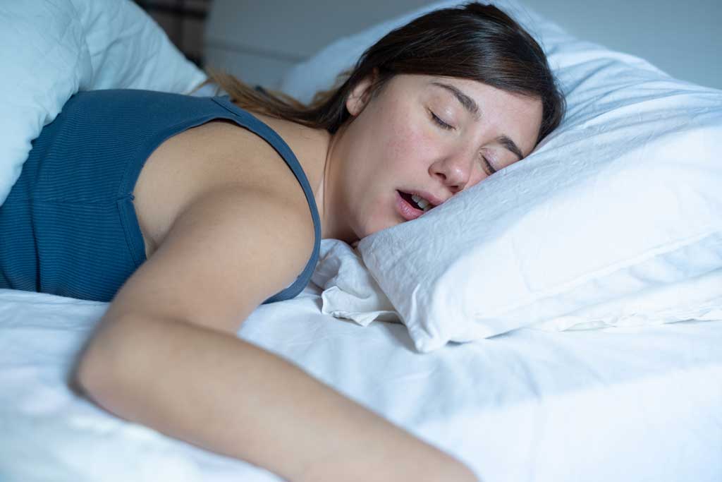 Woman-snoring-in-bed,-caused-by-nasal-septum-deviation