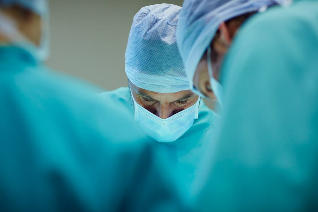 Surgeons-in-operating-room-performing-Beverly-Hills-tonsil-surgery
