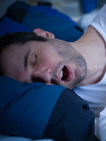 Male-snoring-in-bed-with-his-mouth-open-and-needing-LATERA-implant Male-snoring-in-bed-with-his-mouth-open-and-needing-LATERA-implant