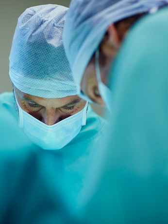 Surgeons-in-operating-room-performing-Beverly-Hills-tonsil-surgery Surgeons-in-operating-room-performing-Beverly-Hills-tonsil-surgery