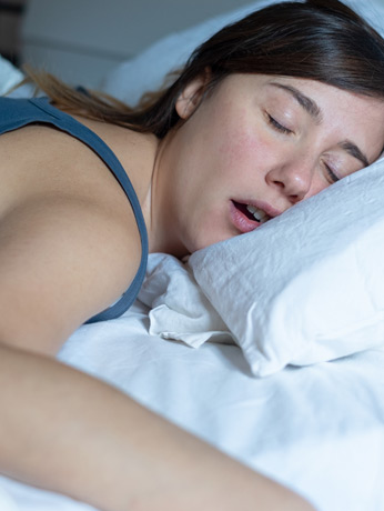 Woman-snoring-in-bed,-caused-by-nasal-septum-deviation Woman-snoring-in-bed,-caused-by-nasal-septum-deviation